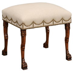 English Carved Oak Stool with Upholstered Seat and Lion Paw Feet, circa 1880