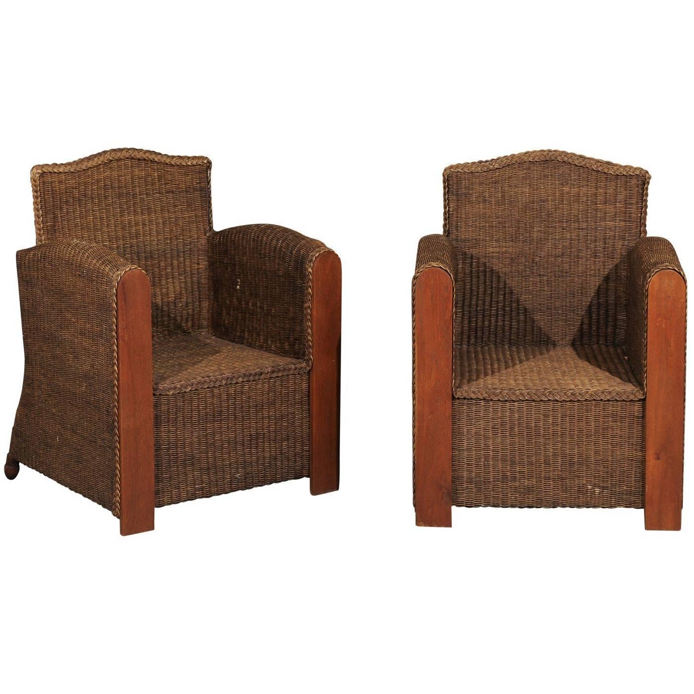 Pair of French Vintage Wicker Club Chairs with Camel Back and Tall Arms For Sale