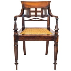 Early 19th Century English Regency Colonial Carved Padouk Campaign Desk Armchair