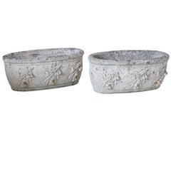 Pair of 1920s Cast Stone Planters with Olive Decoration from France