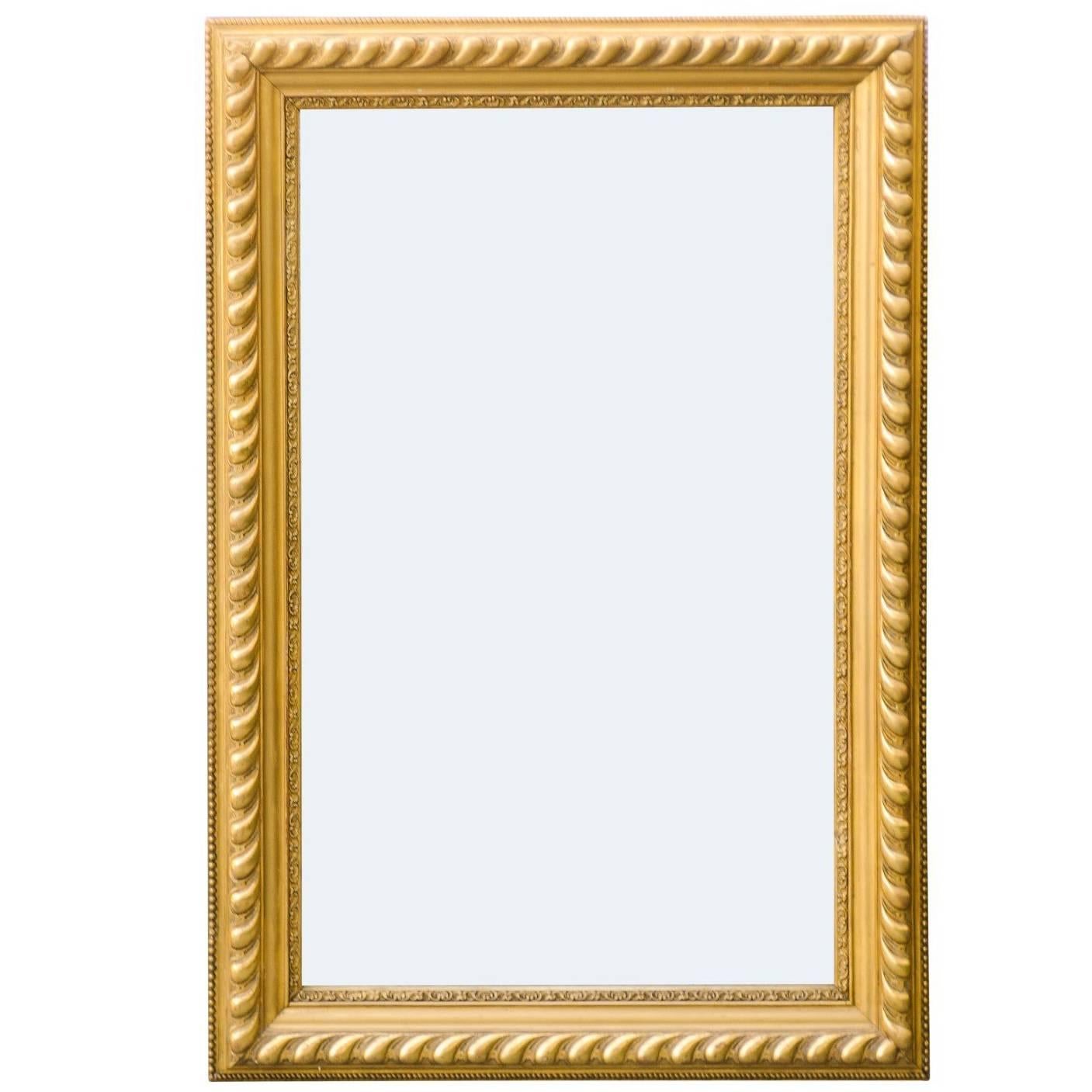 French Rectangular Giltwood Mirror with Gadrooned and Beaded Frame, circa 1900