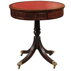 Early 19th Century English Regency Revolving Drum Table with Red Leather Top