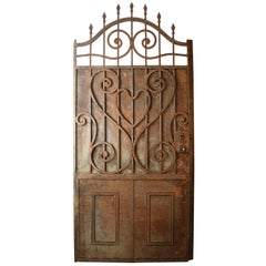 Arched Iron Door with Scrollwork, circa 1900