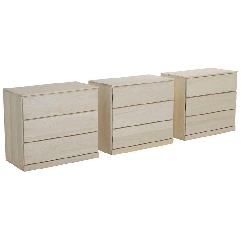 Three White Bleached Oak ThreeDrawer Chest of Dressers by L. Ronney