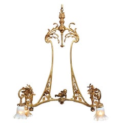French 19th Century Ormolu Four-Light Chandelier with Flying Cherub and Foliage
