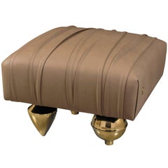 "Il Pezzo 1 Pouf" ottoman upholstered in fine leather with a polished brass base