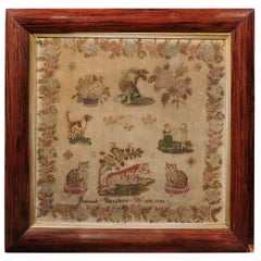 English Framed Petit Point Sampler with Animals and Floral Motifs, circa 1840