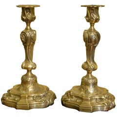 Pair of French Rococo Brass Candlesticks