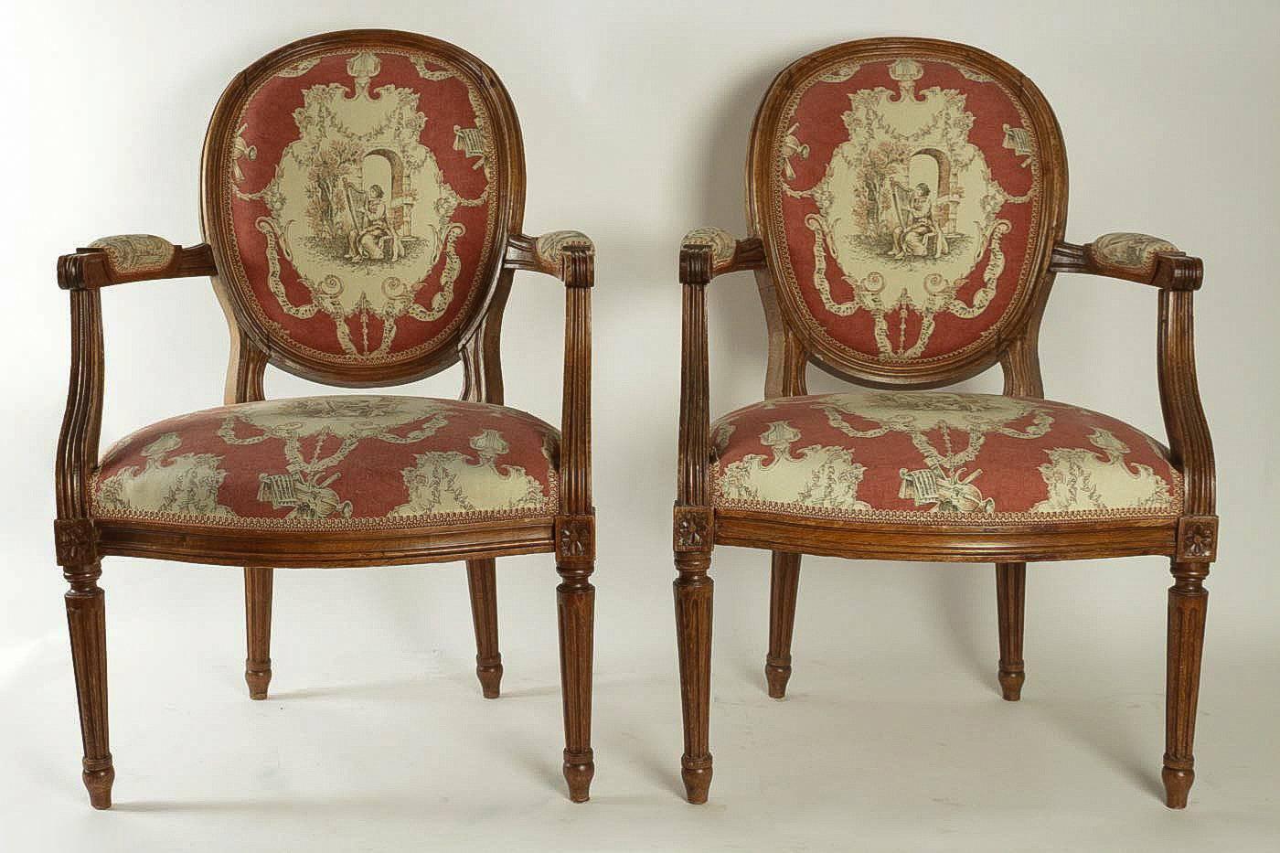 We are pleased to present you a gorgeous hand-carved Louis XVI style fruitwood set of four armchairs.

French work 19th century.

Excellent condition. These beautiful open armchairs are very solid, and there has been upholstered with a new red