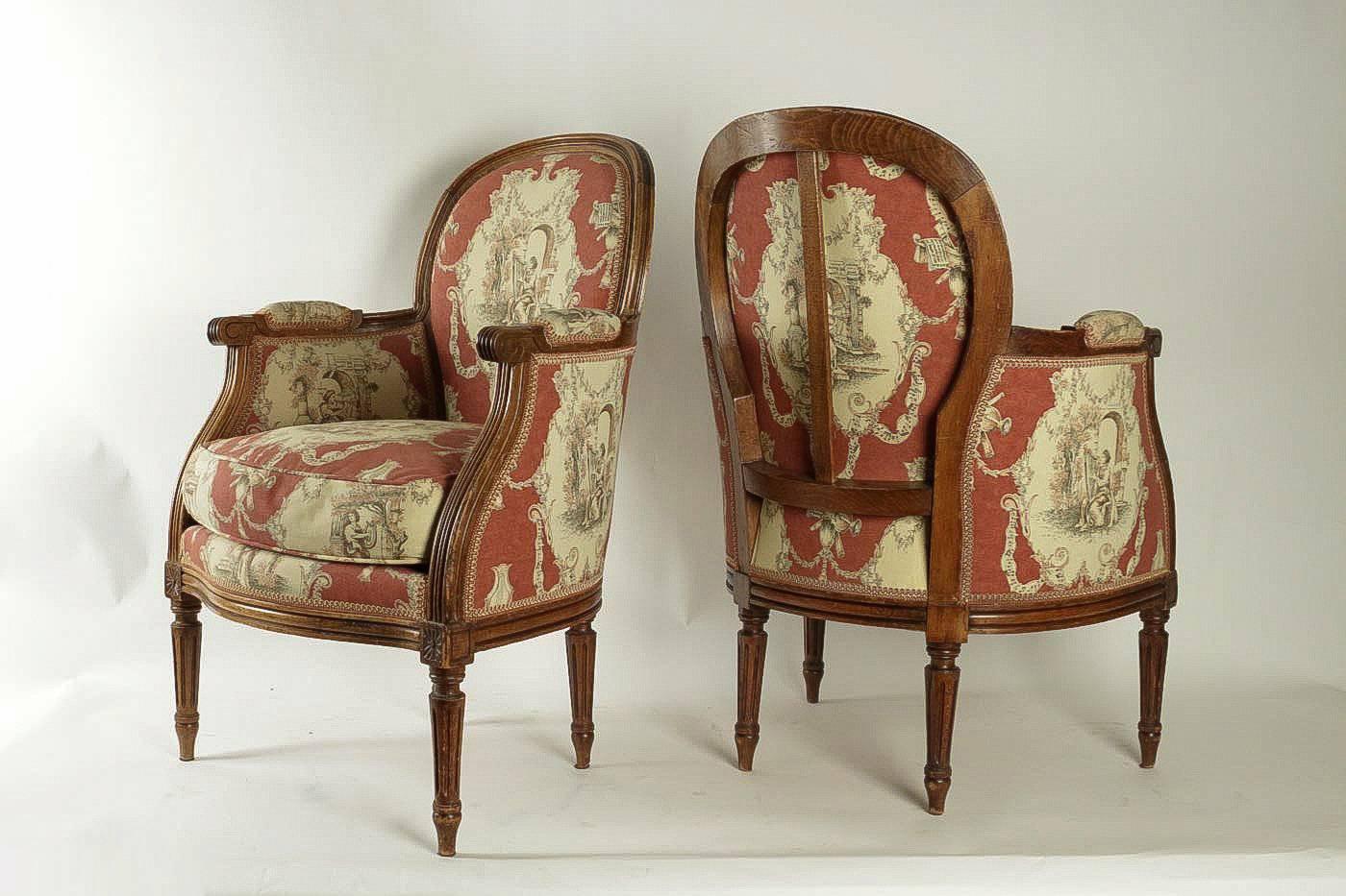 Pair of French 19th Century, Louis XVI Style Fruitwood Bergeres For Sale 3