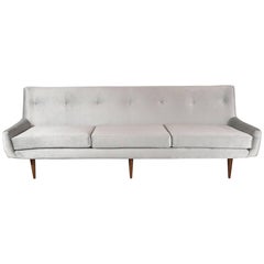 Mid-Century Modern Button Back Sofa with Tapered Hand Rubbed Walnut Legs