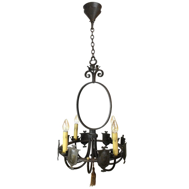 Iron Four Candle Ring Chandelier with Shields at 1stDibs