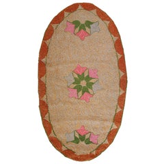Handmade Antique American Oval Hooked Rug, 1920s