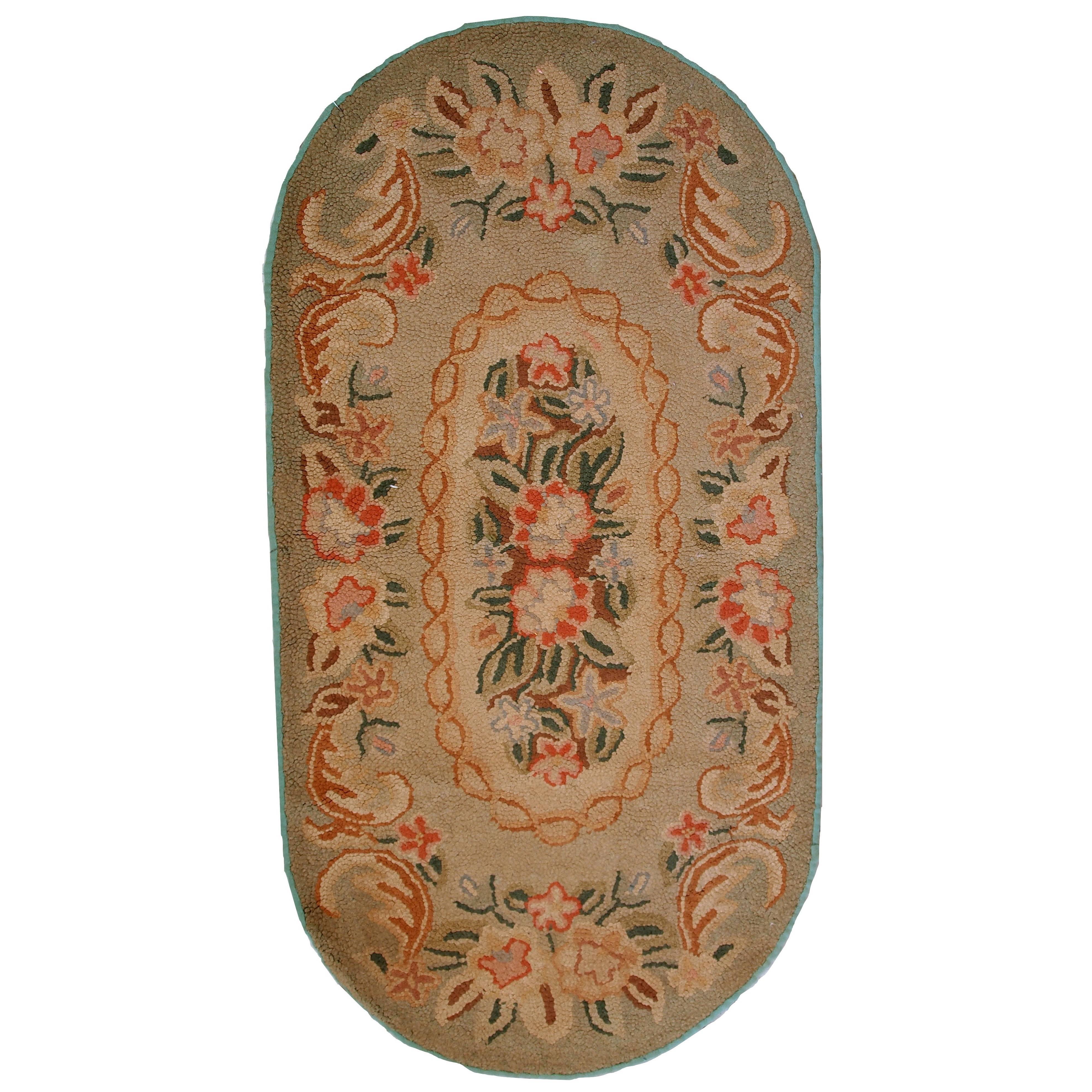 Handmade Antique American Oval Hooked Rug, 1930s