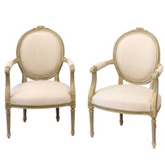 Used Pair of 1880s French Louis XVI Style Oval Back Painted and Carved Armchairs