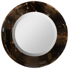 Modernist Smoked and Beveled Circular Mirror in the Manner of Karl Springer