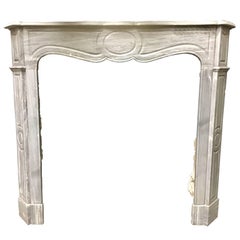 Antique French Louis XVI Pompadour Style Marble Fireplace Surround.