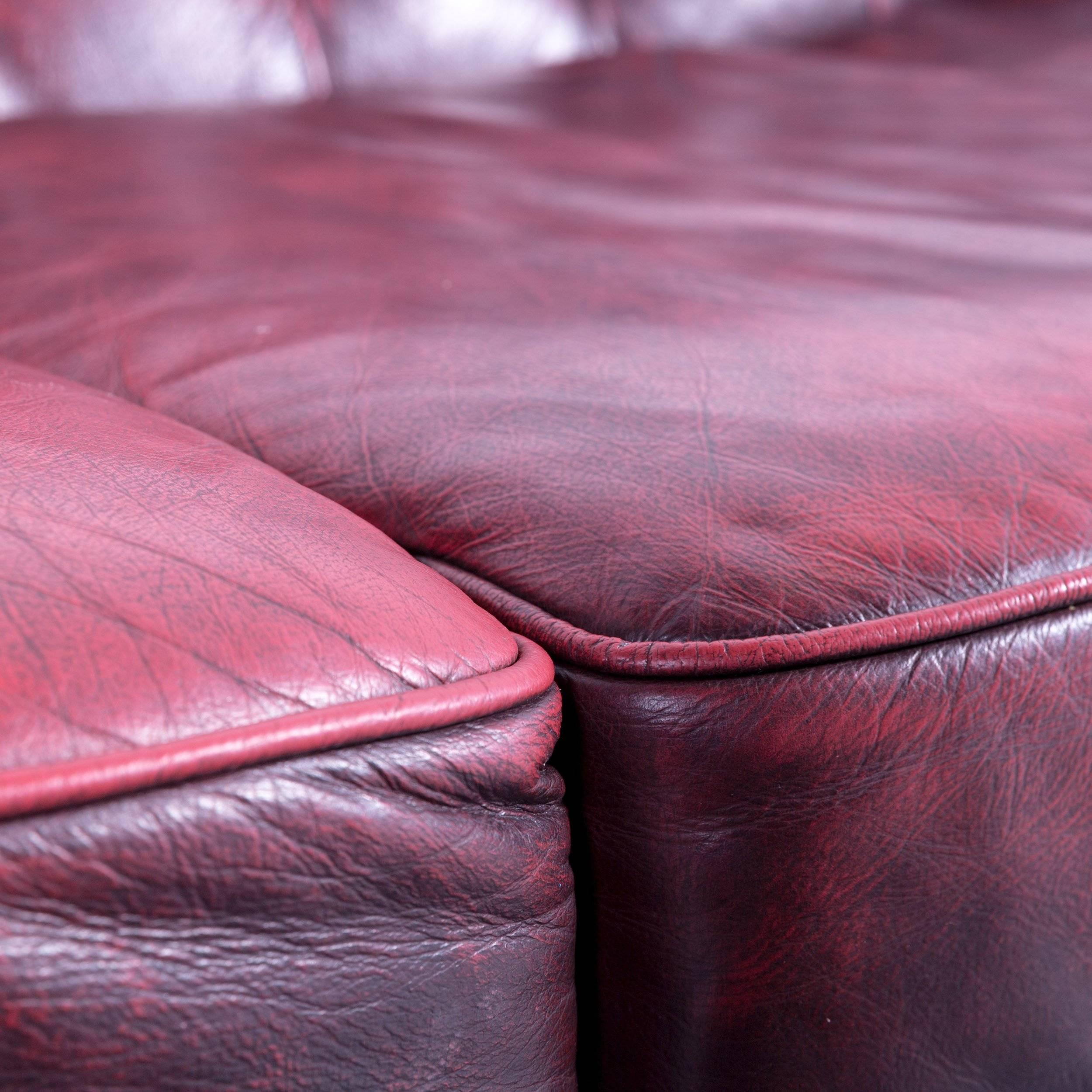 oxblood chesterfield couch