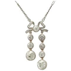 Antique 1920s 5.15 Carat Diamond and 10k Yellow Gold 'Bow' Pendant 9