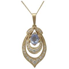 1980s 1.10 Carat Aquamarine and 0.92 Carat Diamond, Yellow Gold Pendant 2