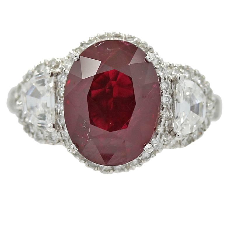 18K White Gold Ring with Oval Heated Burma Ruby and Diamonds For Sale