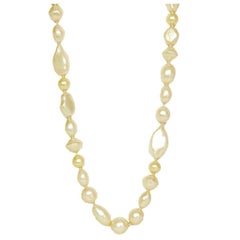 Chanel 1983 Vintage Long Multishape Faux Pearl Necklace Gripoix Closure 