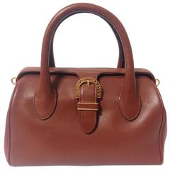 Vintage Valentino Garavani, brick brown leather mini handbag with golden logo
