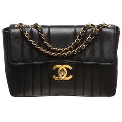 Chanel Black Caviar Vertical Quilted Maxi Handbag