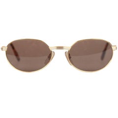 Lunettes de soleil CARTIER Paris vintage ovales dorées mod. LUEUR 53-19 135 NOS