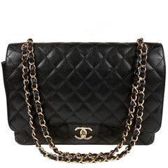 Chanel Black Caviar Maxi Classic Double Flap Bag with Gold Hardware