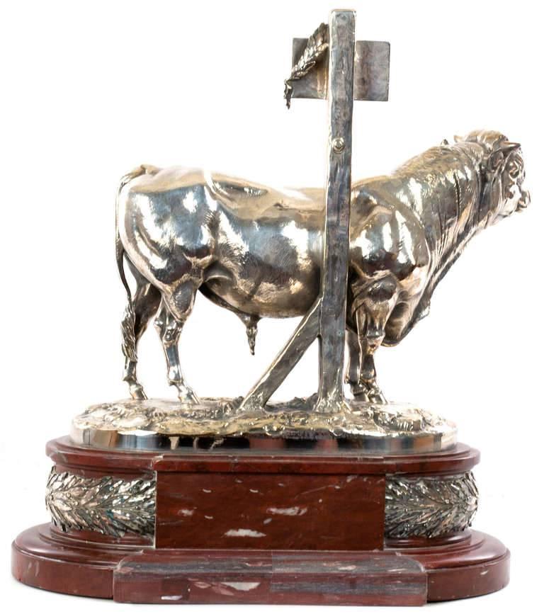 This Premier Prix statue, commissioned by the Ministries of Agriculture and Commerce, embodies the highest of French values by ennobling traditional farm work with world-class artistry and rich materials. The silvered-bronze statue of a