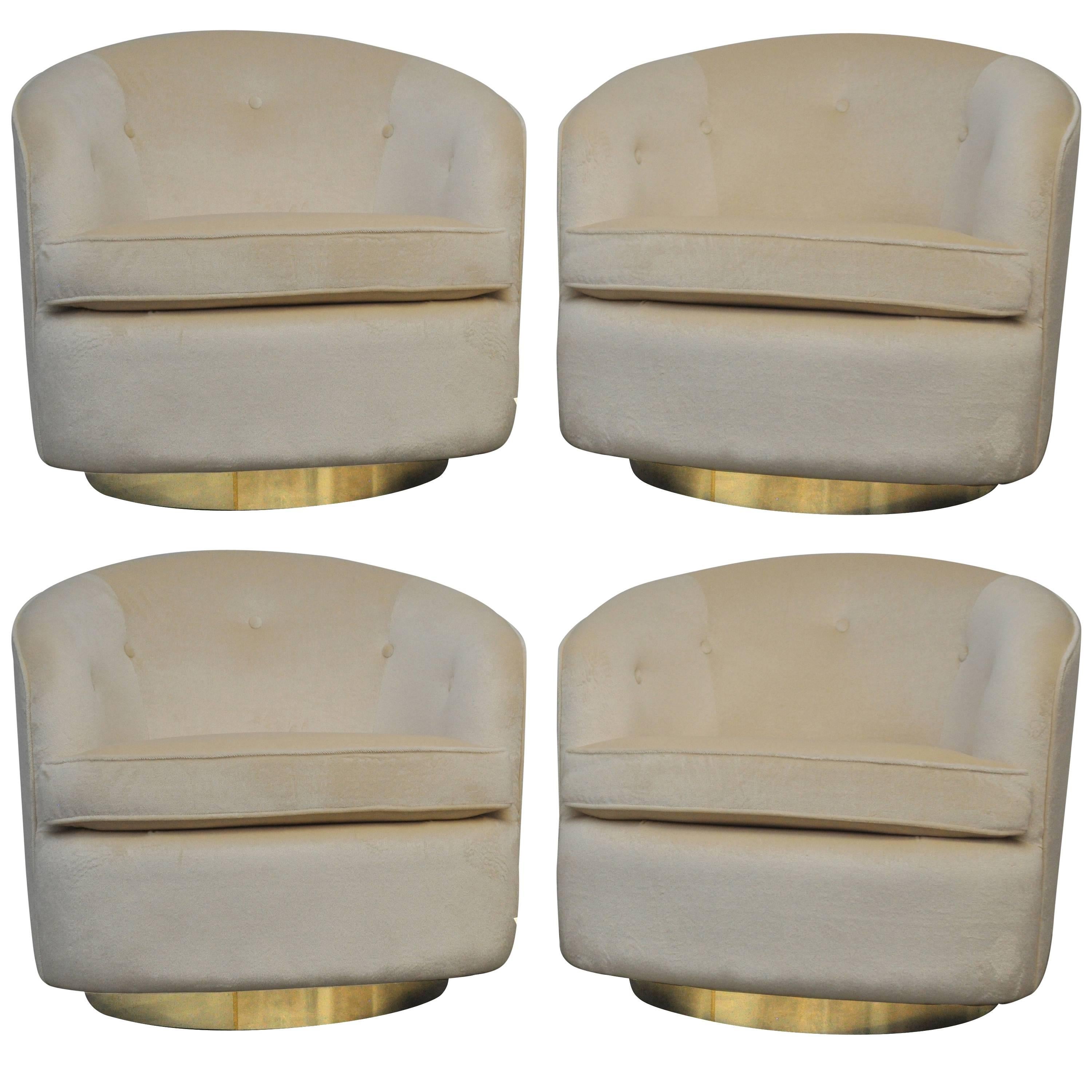 Set of Four Milo Baughman Swivel Chairs on Brass Bases