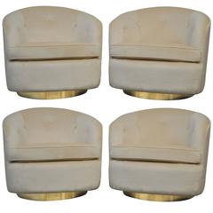 Set of Four Milo Baughman Swivel Chairs on Brass Bases