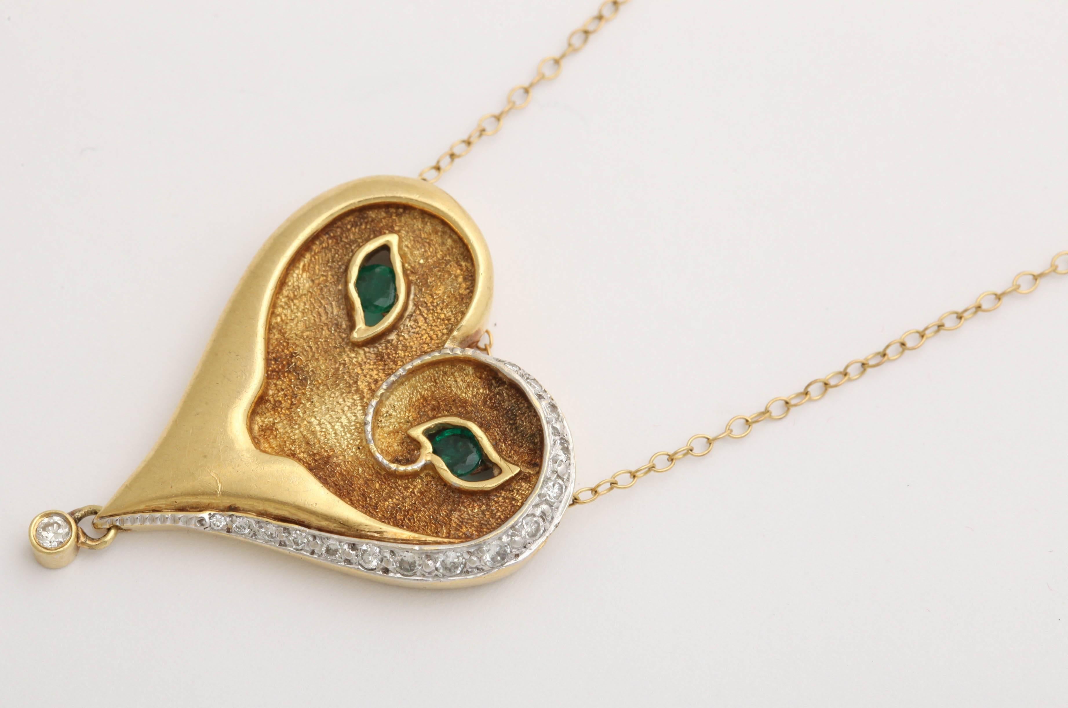 Art Deco Erte Gold Heart Mask Necklace Diamonds and Emeralds