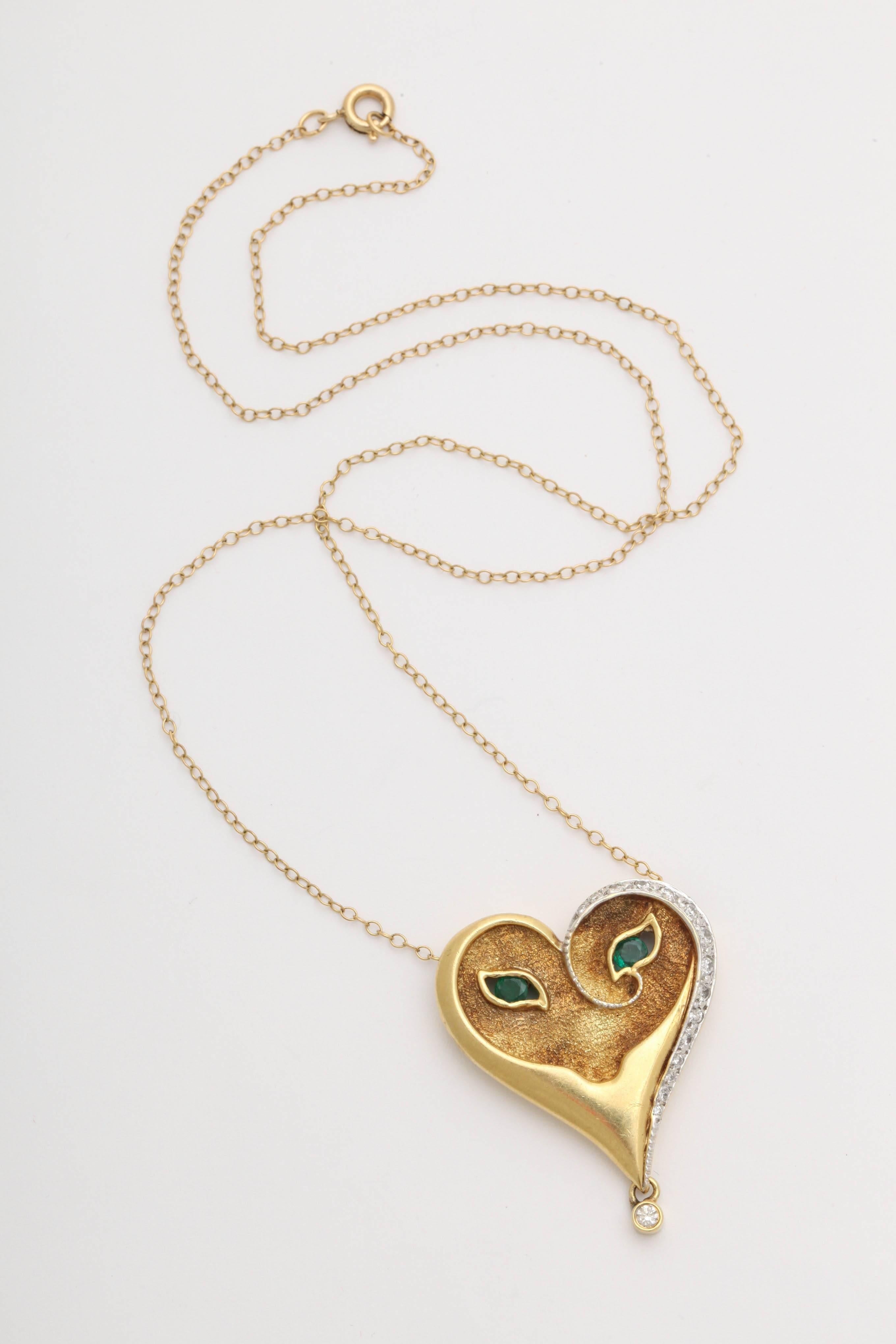 Erte Gold Heart Mask Necklace Diamonds and Emeralds In Excellent Condition In New York, NY
