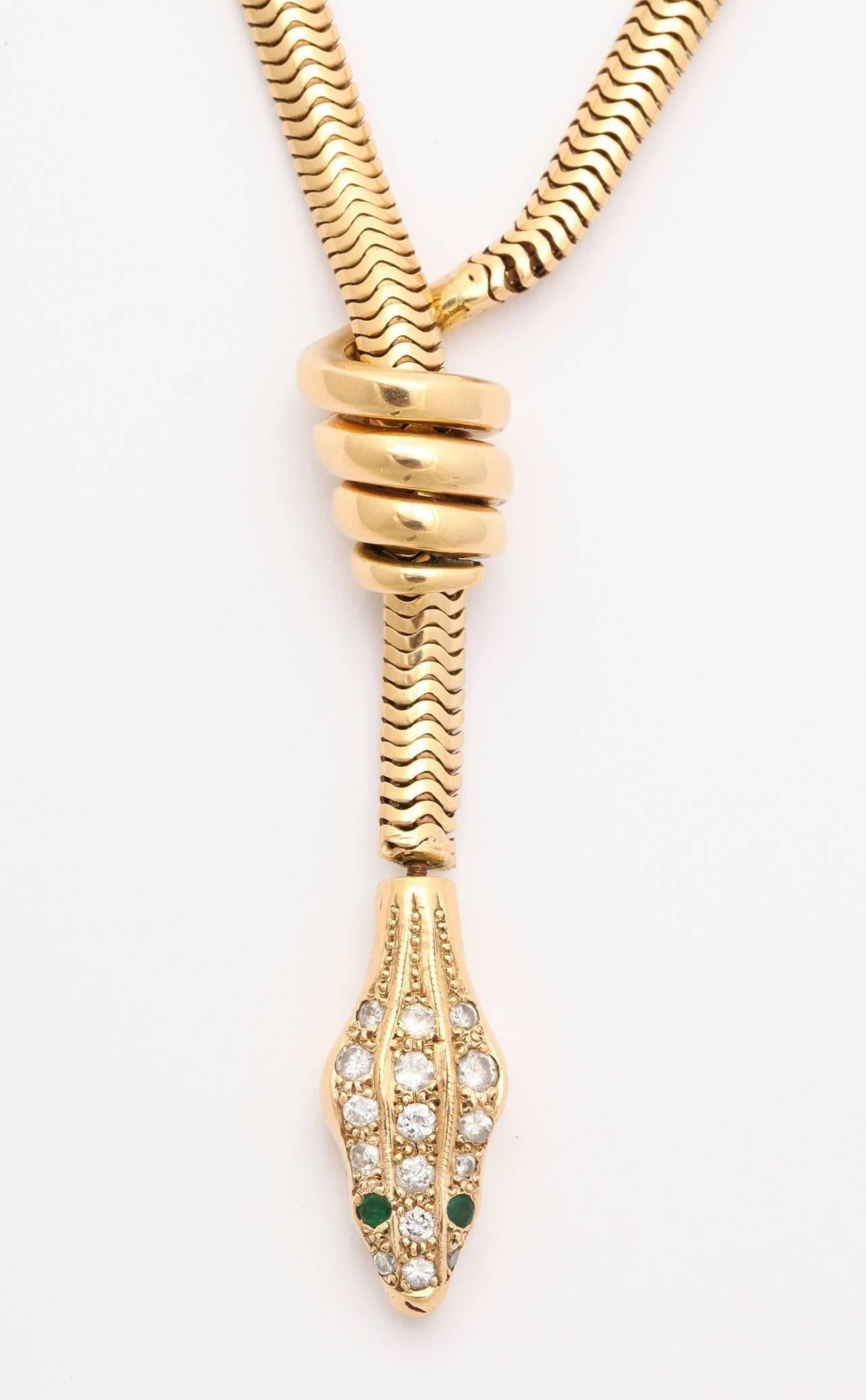 Women's Rare Gold Snake Necklace with Diamond and Emerald Encrusted Head