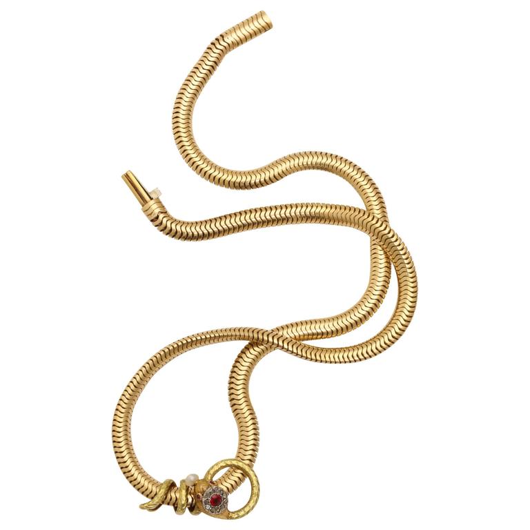 Classic Gold Snake Necklace with Diamonds Rubies and Pearl For Sale at