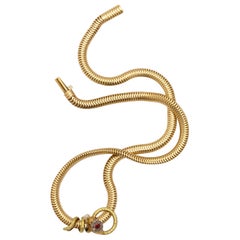 Classic Gold Snake Necklace with Diamonds Rubies and Pearl