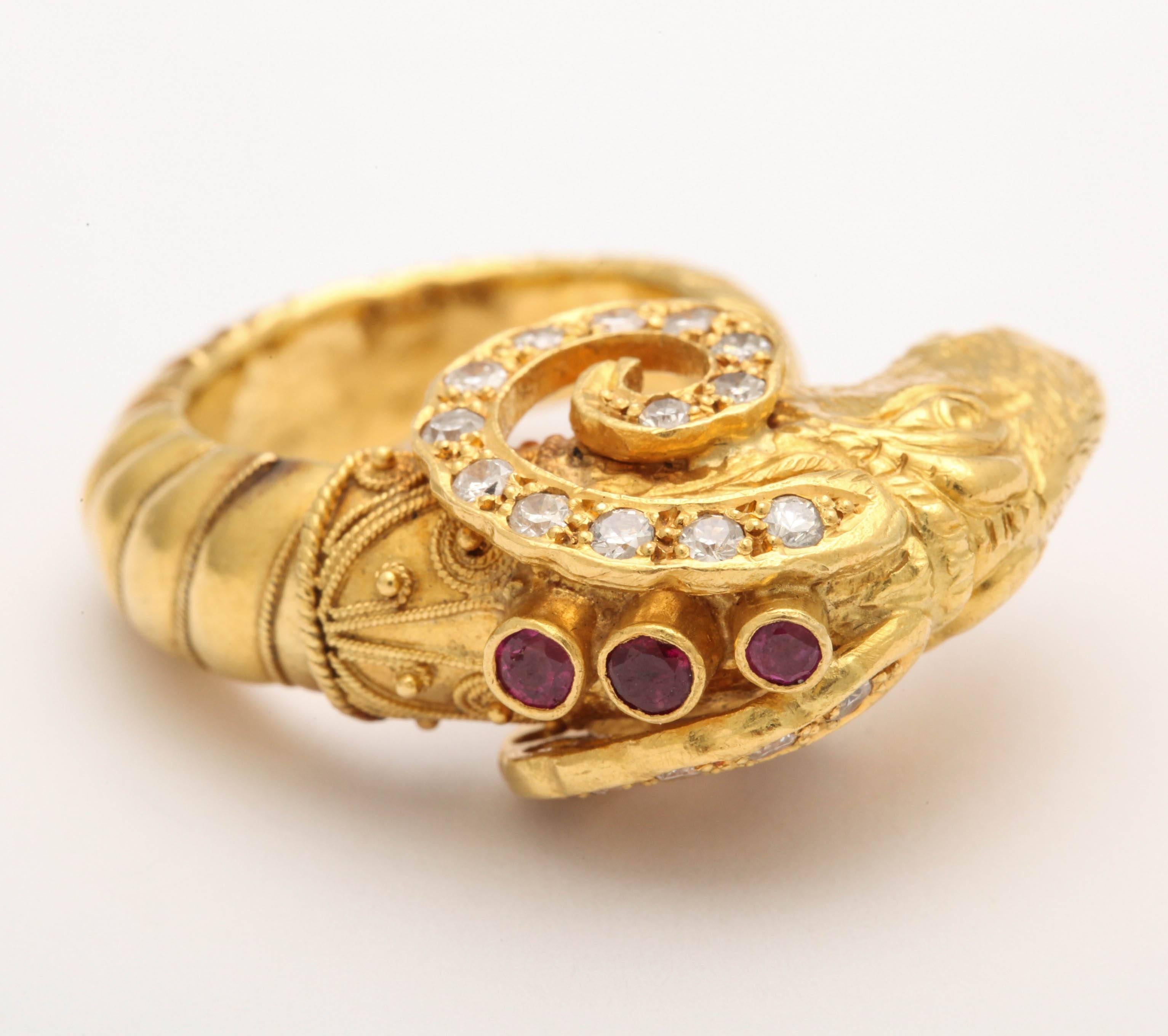 A spectacular finely crafted 18 kt gold rams head ring with inset diamonds and rubies. In an Etruscan style mounting.. a statement piece,