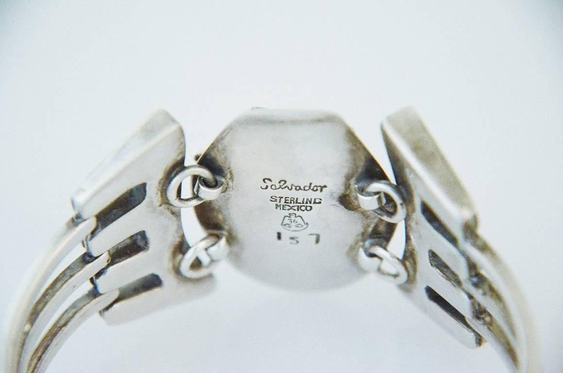 Being offered is a circa 1960 sterling silver bracelet by Salvador Teran, of Taxco, Mexico,  Wearable length 6 inches.  Marked.  In excellent condition.
