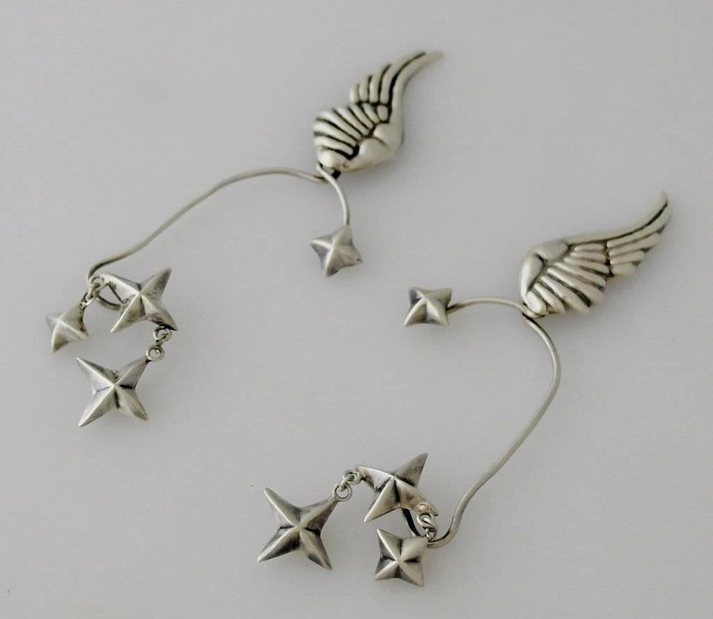 Hubert Harmon Taxco Sterling Silver Wings and Stars Wrap Around Earrings In Excellent Condition For Sale In New York, NY