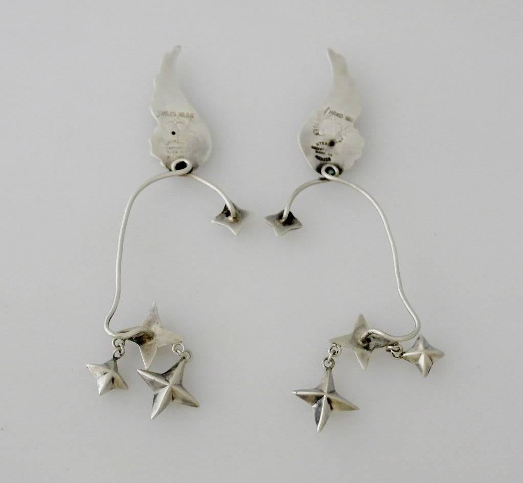 Being offered is a circa 1947 pair of earrings by Hubert Harmon of Taxco, Mexico.