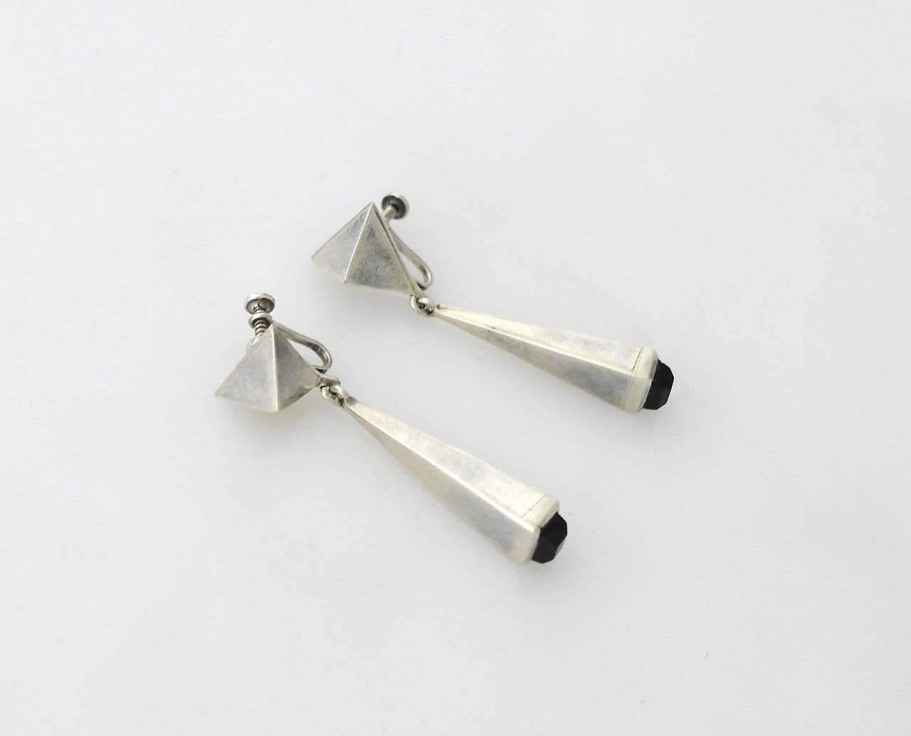 For sale is the most iconic and breathtaking matching set of jewelry from the golden Taxco period in Mexico created by the renowned silversmith Antonio Pineda (1919-2009). Given the name Matchstick because its trapezoidal design elements that