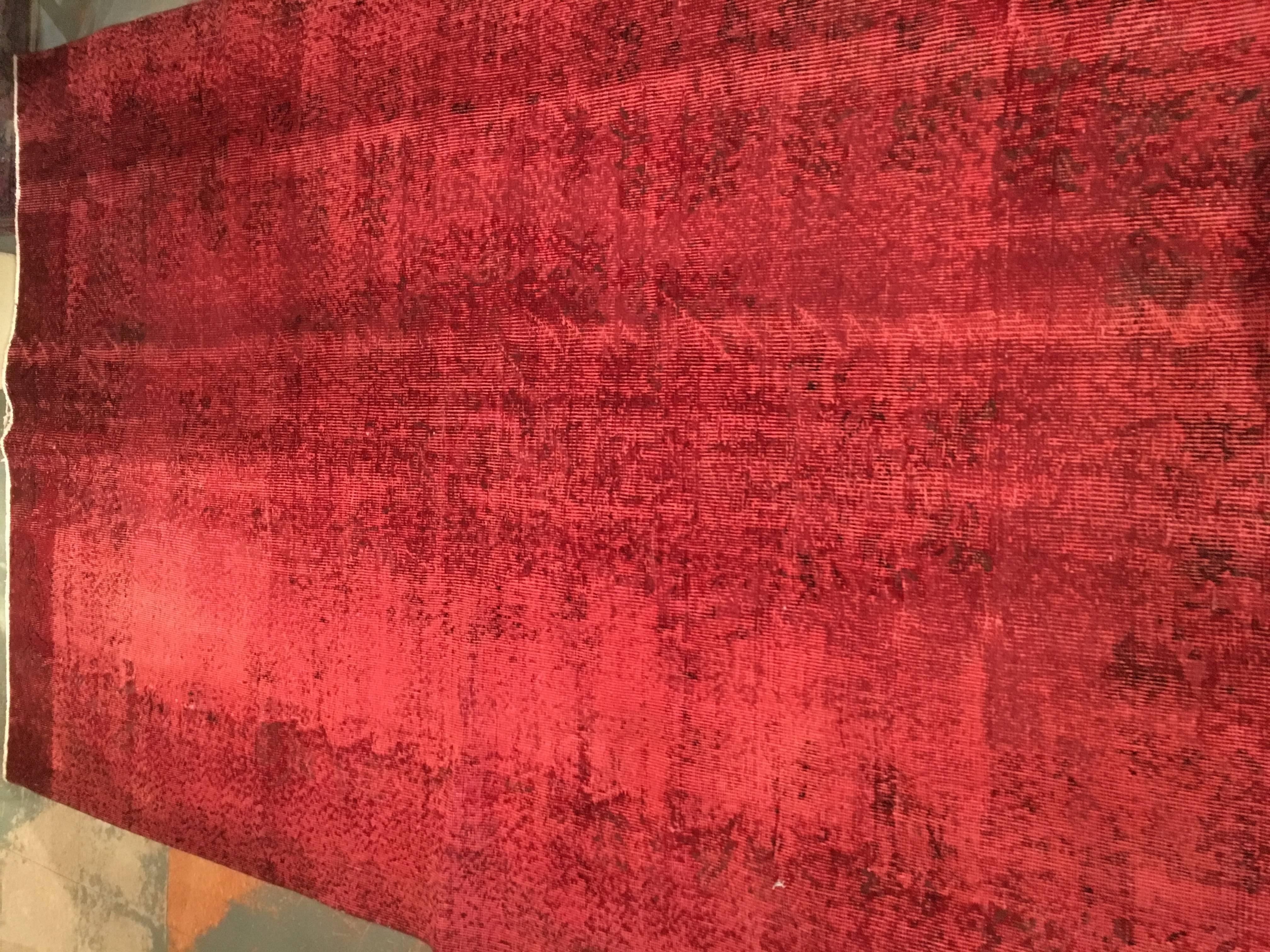 Nice mid size overdyed rug in reds with touches of black
Measures: 57 1/2 x 93 1/2.