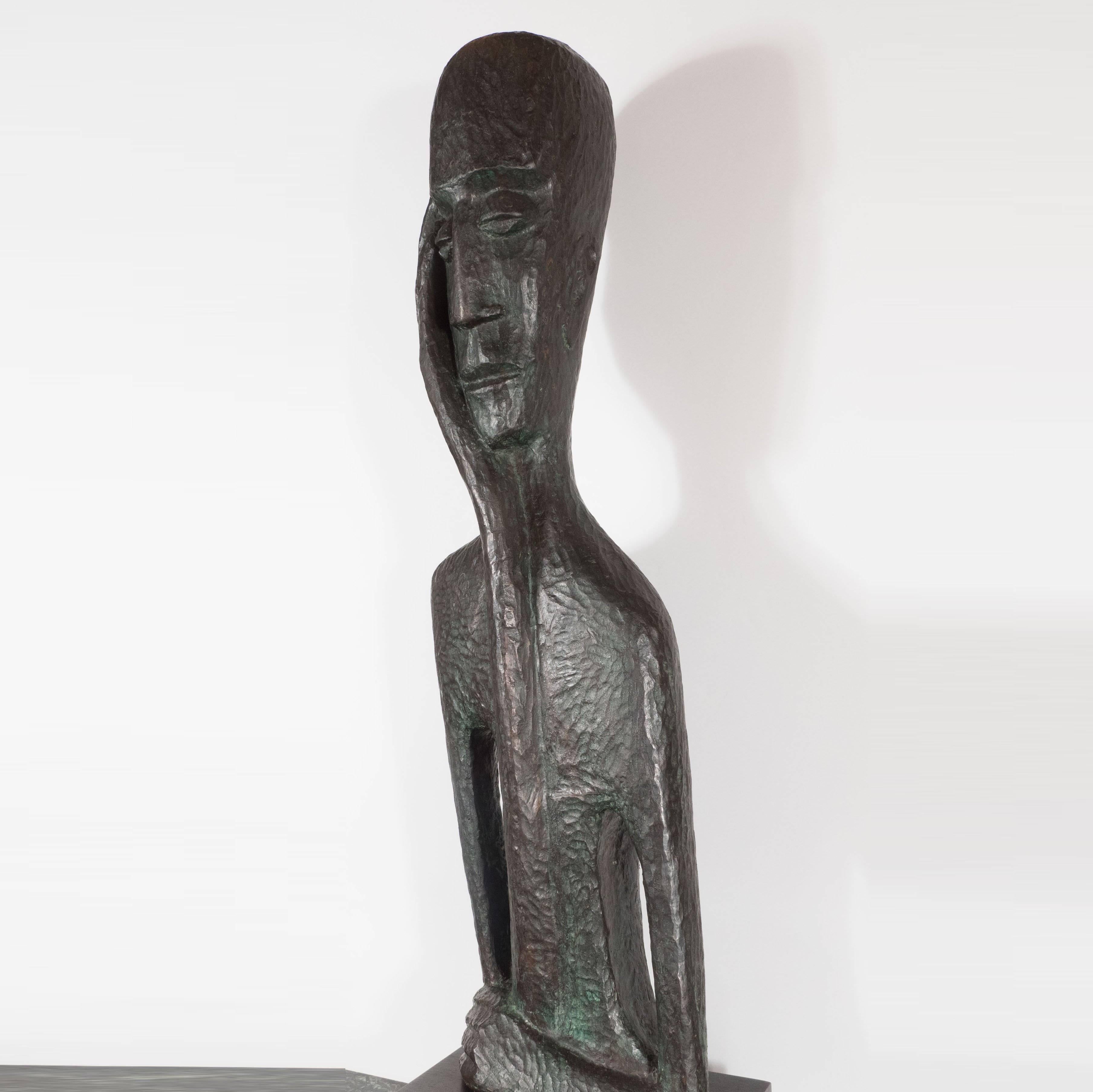 This impressive bronze sculpture was obtained in Israel by a prominent American collector, circa 1975. It presents a stylized male figure with his hand resting against his cheek with his eyes closed in a contemplative expression. The artist has