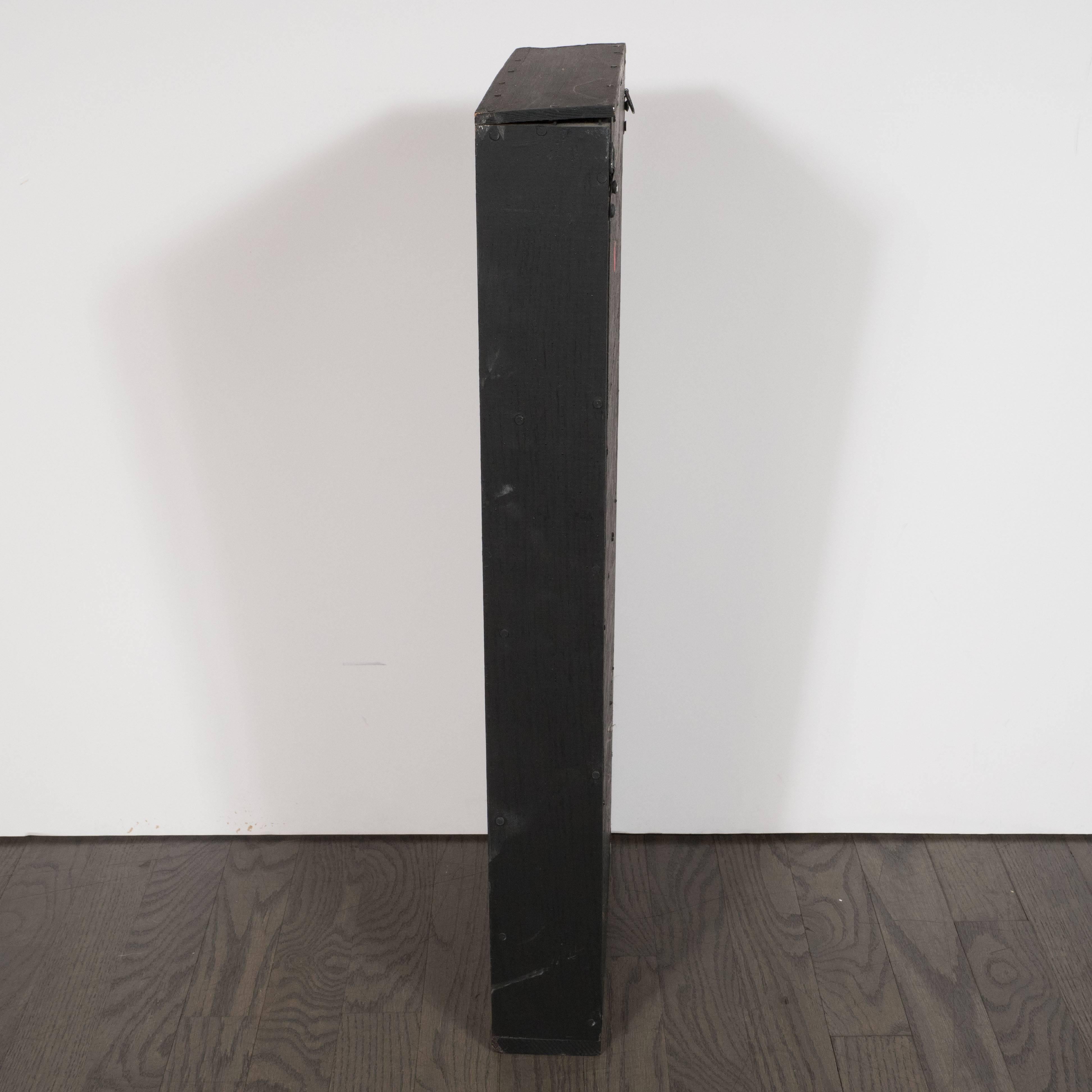This dynamic mixed media construction was realized by the esteemed American artist Ladislas Segy (1904-1988)- whose work is represented in the collection of the Brooklyn Museum of Art- circa 1965. It consists of nine cylindrical aluminum rods