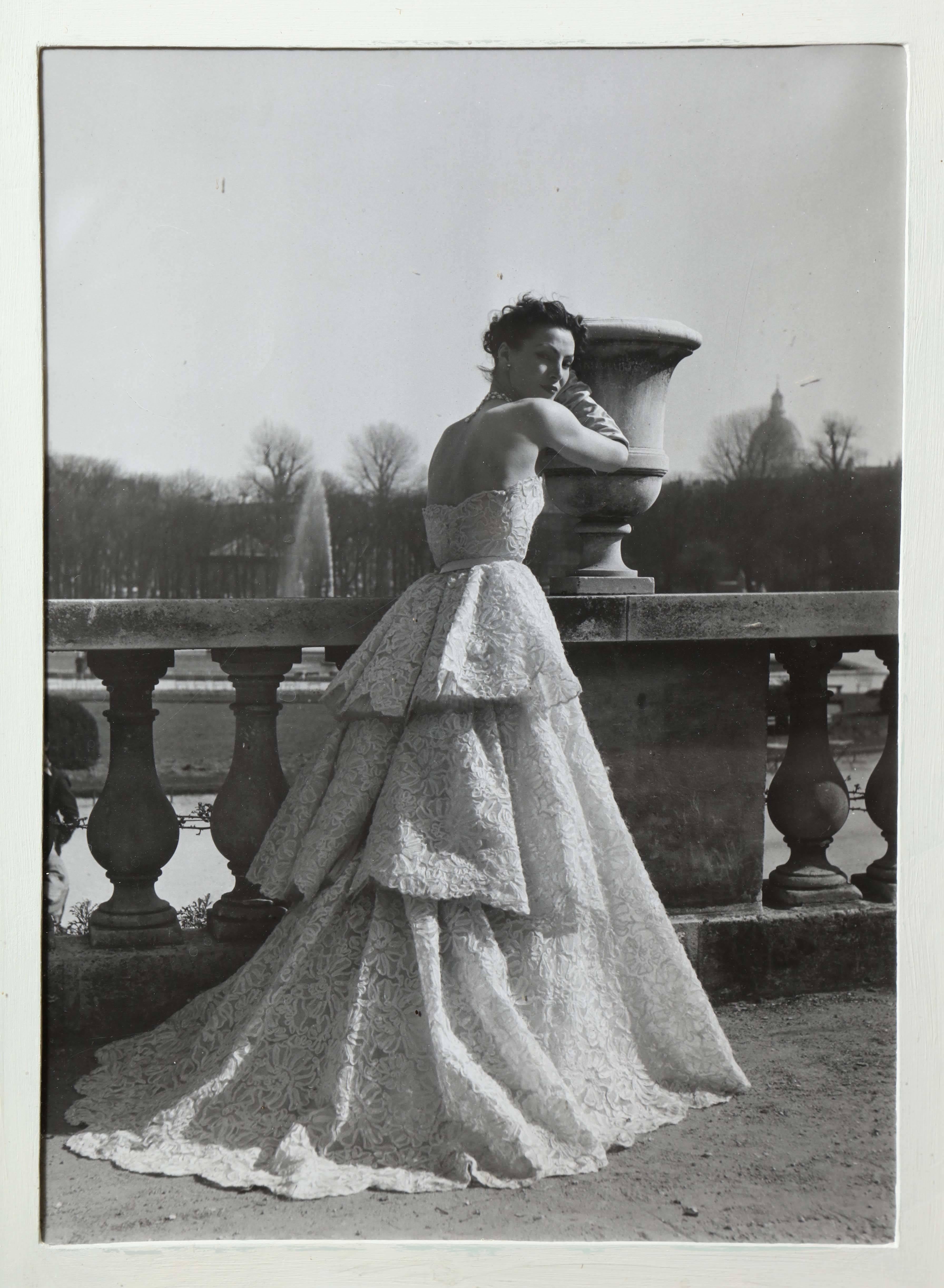 Lucky wearing a Dior evening gown - Photograph by Willy Maywald
