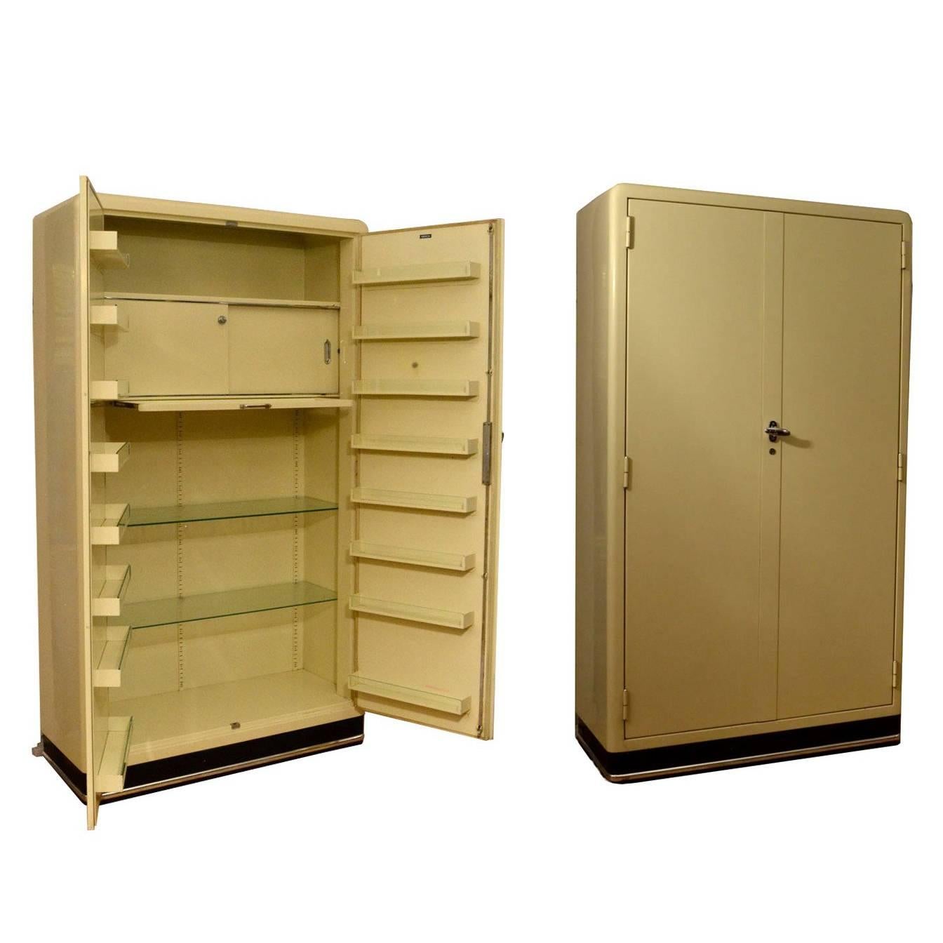 Pair of 1930s Modernist Industrial Cream Metal Pharmaceutical Storage Cabinets