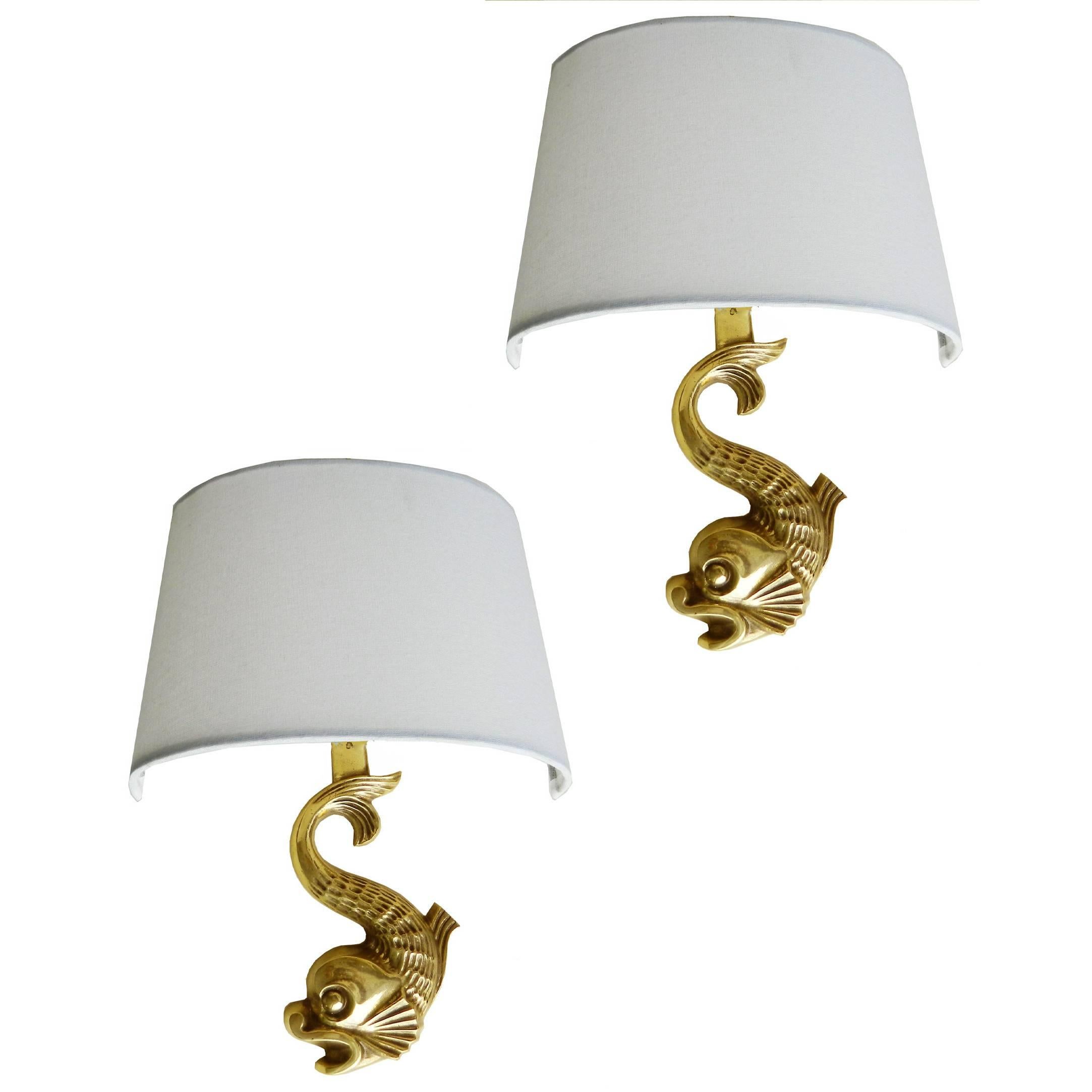 Two pairs available of bronze wall sconces by Emile Guillemard.
Priced by pair.
Provenance: Hotel Plaza, Biarritz, France.
Also available : Pair of seahorses, pair of Horses
Measured without shade.
US wired and in working condition.
 Have a
