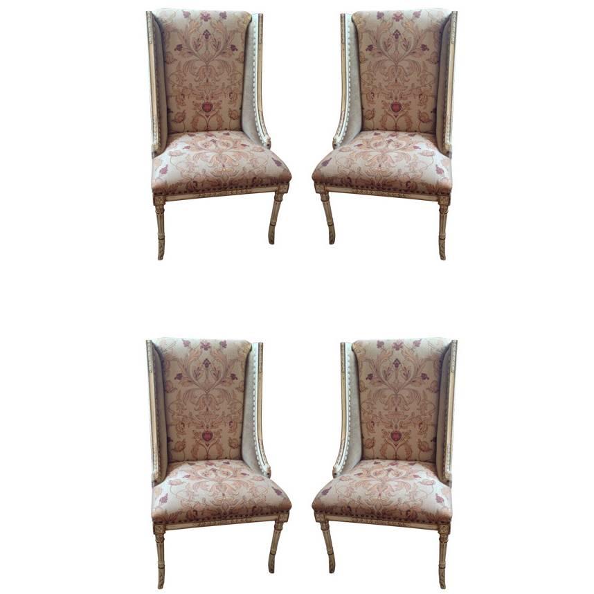Four Sublimely Upholstered Painted and Carved Wooden Dining Chairs